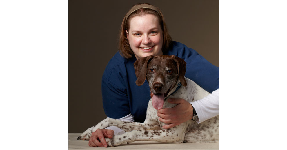 Megan Brashear, Petplan 2014 vet tech of the year, and canine friend